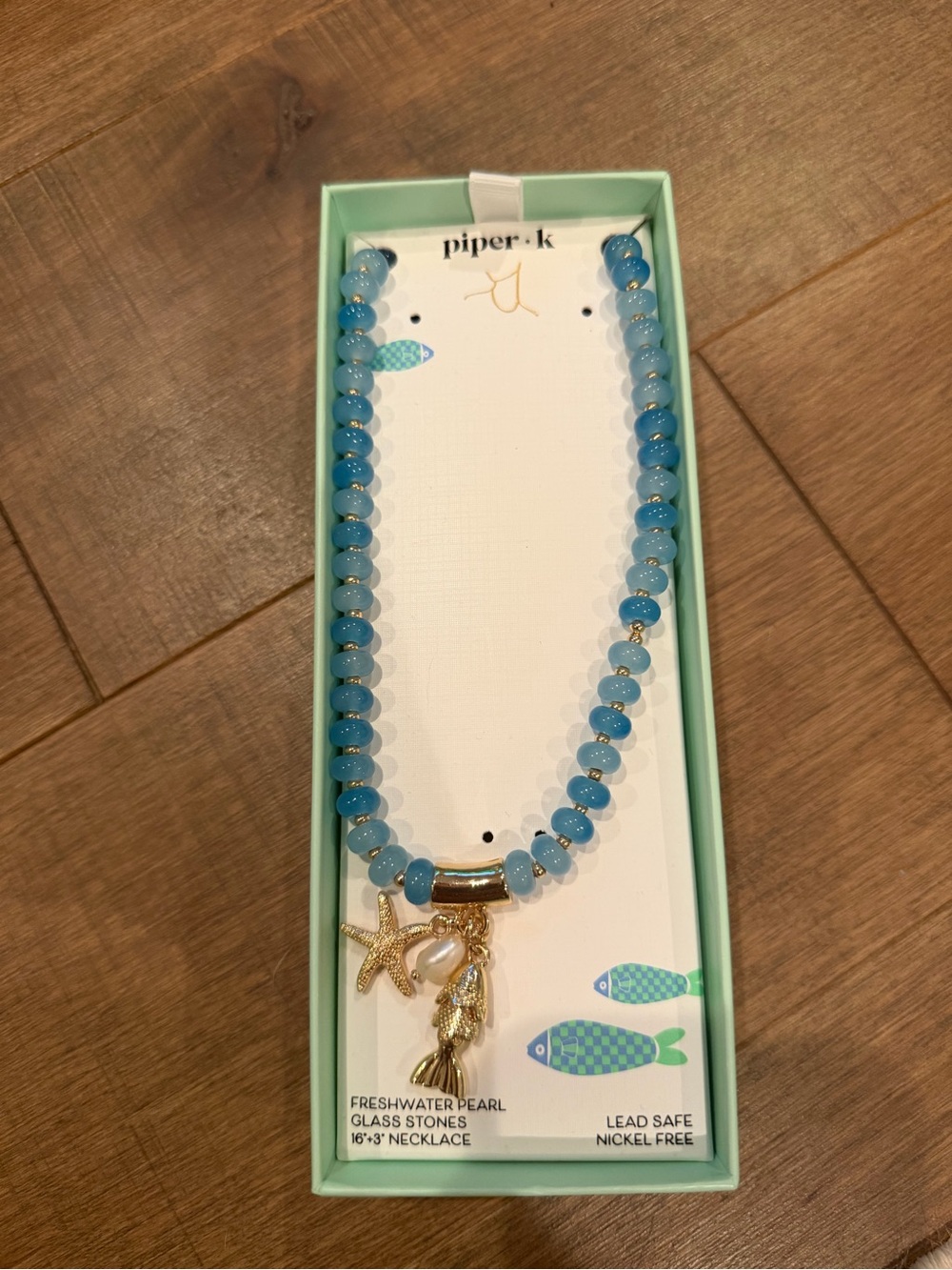 Piper K Blue Glass Beaded Necklace with Gold Sea Charms and Pearl